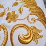 detalles del manto virgen silla